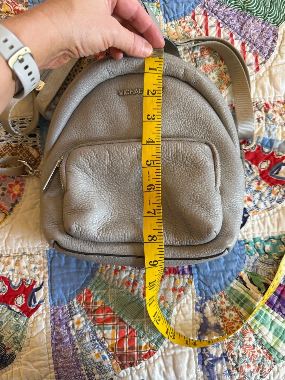 Michael Kors Pebbled Leather Mini Backpack in Light Gray with Gold Hardware